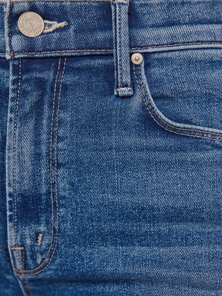 Blauwe flared jeans met uitgerafelde boord The doozy sneak fray Mother