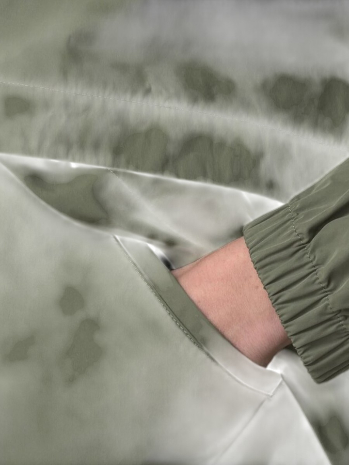 Groene regenjas Aubette Memory Touch Kway