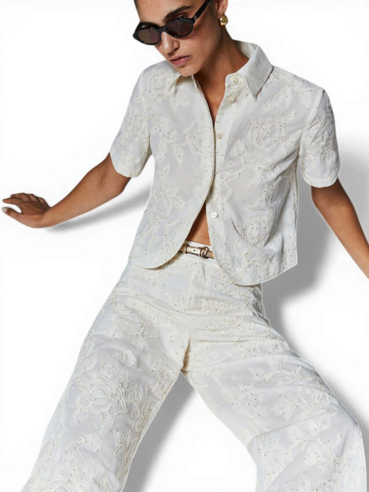 Ecru broek met bloemen structuur en pailletten Liu Jo