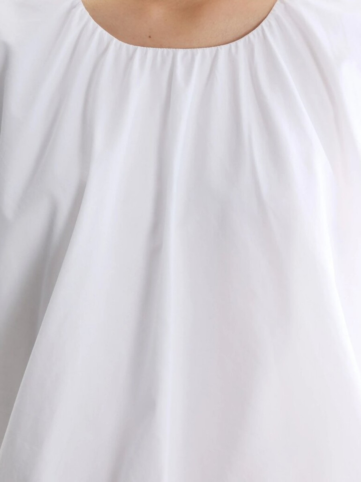 Witte katoenen top met strop onderaan Giada Bellerose 