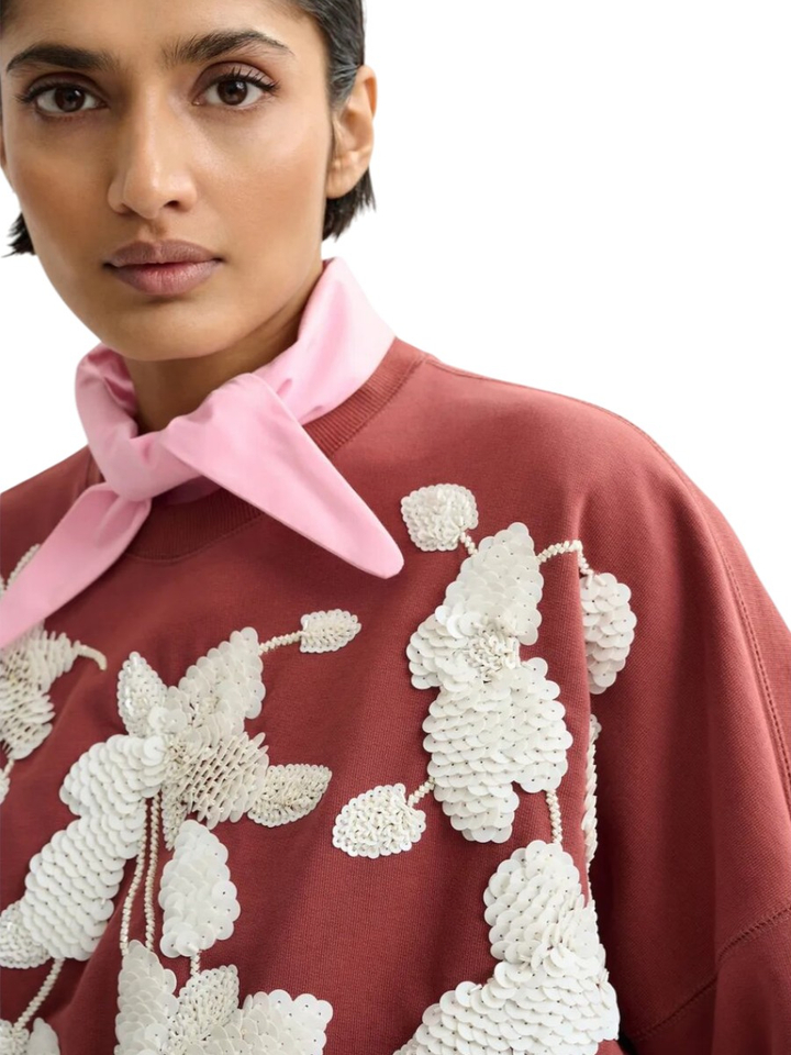 Roestkleurige sweater met bloemen Jaga Essentiel