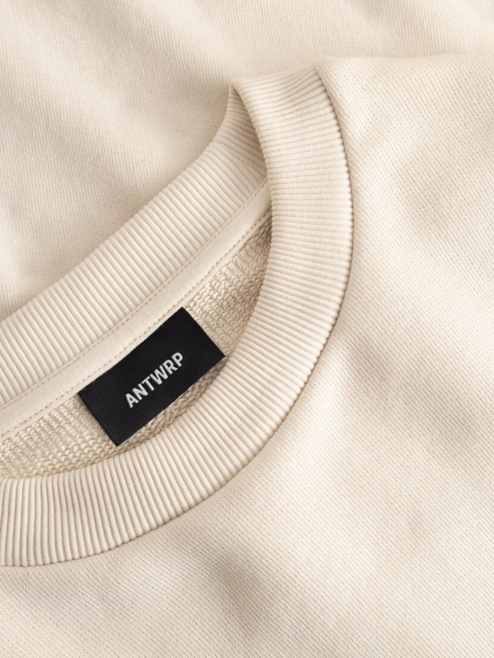 Ecrukleurige sweater met print op rugzijde Antwrp 