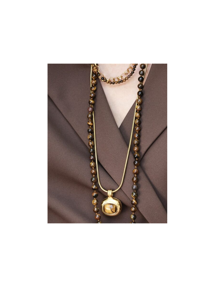 Lange ketting met gouden hanger met gemstone Ellen Beekmans 