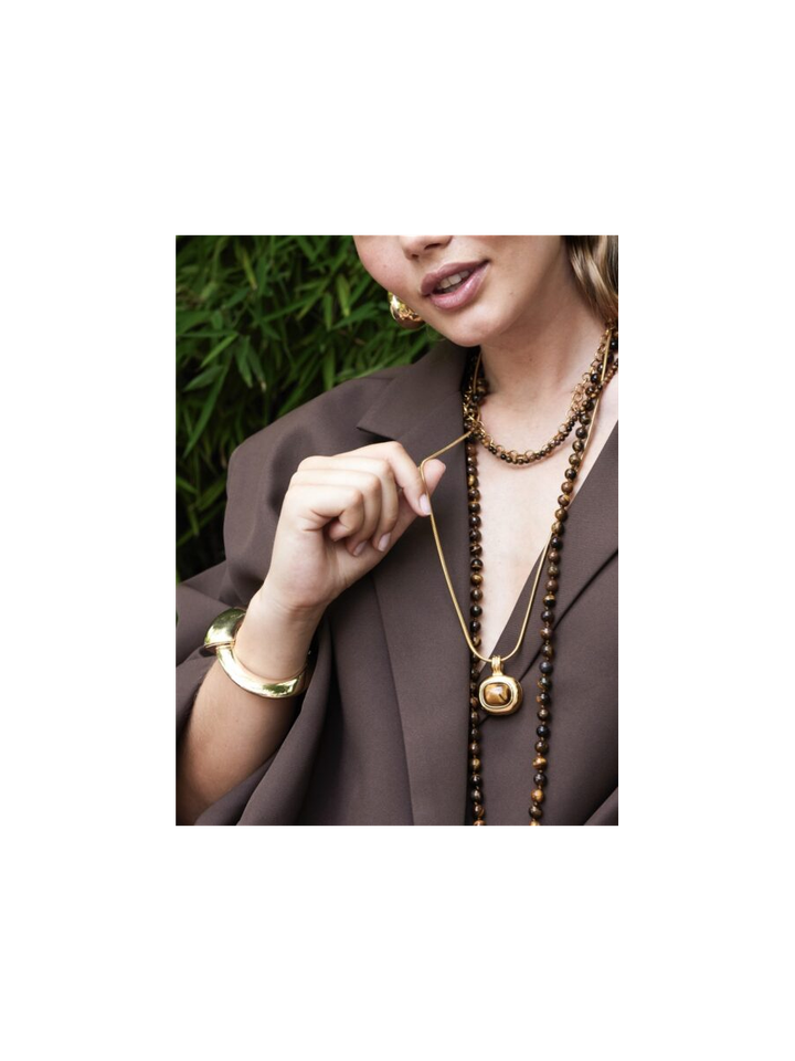 Lange ketting met gouden hanger met gemstone Ellen Beekmans 
