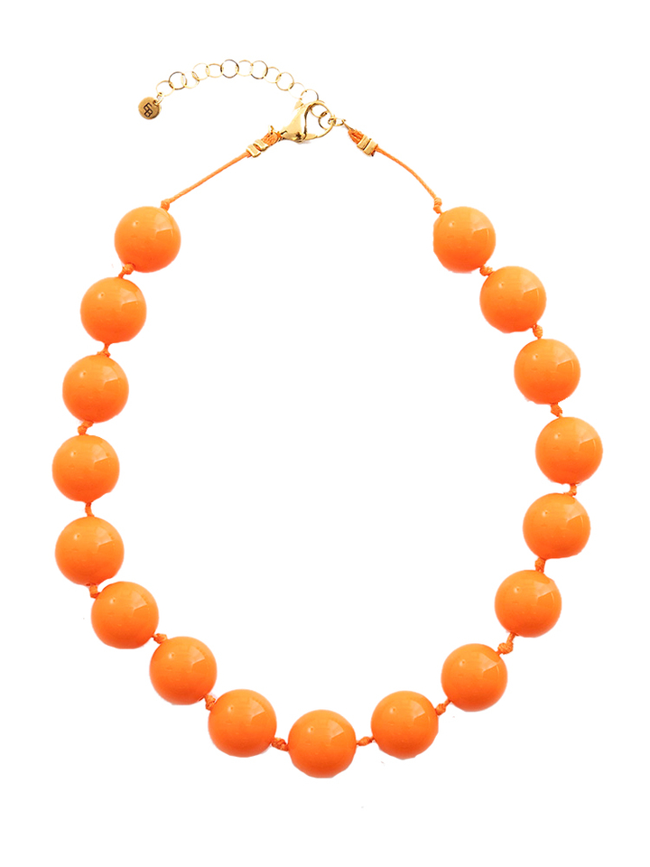 Oranje korte ketting met grote ronde kralen Ellen Beekmans