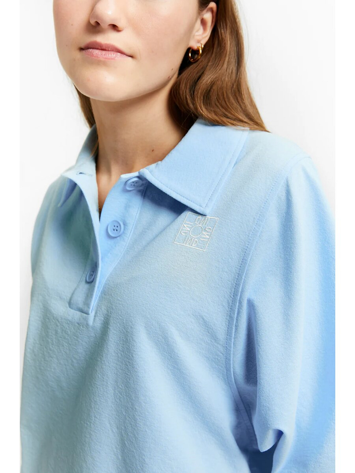 Blauwe polo met logo Variety Indee