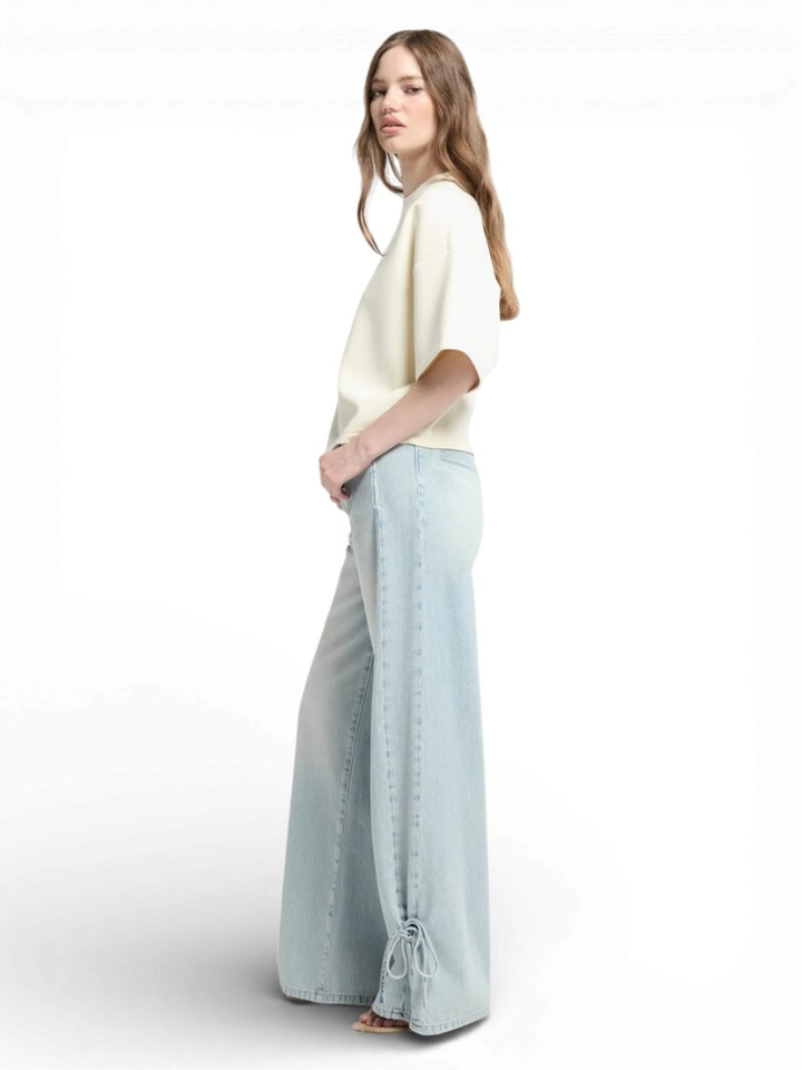 Blauwe loose fit jeans met strik detail onderaan Homage 