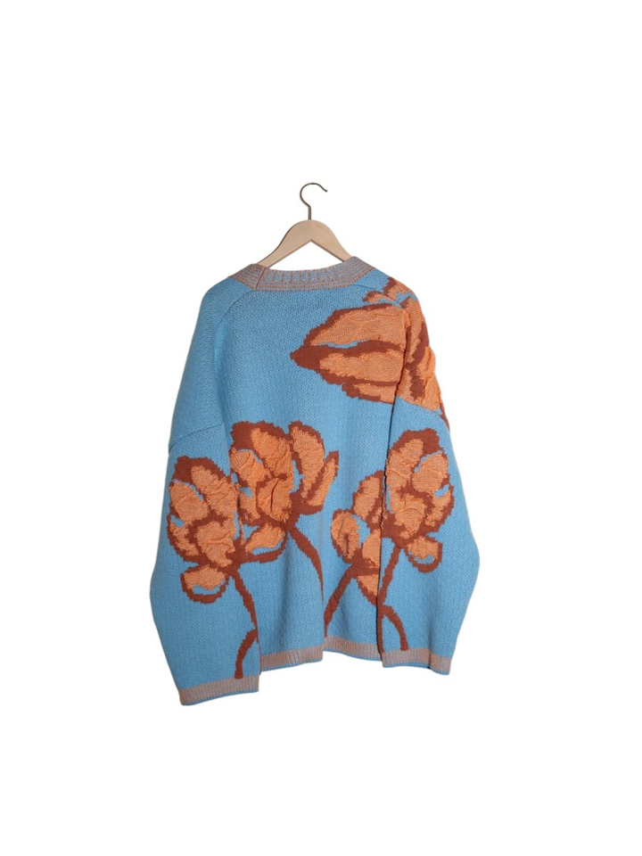 Lichtblauwe gebreide cardigan met oranje print Odussea K&J