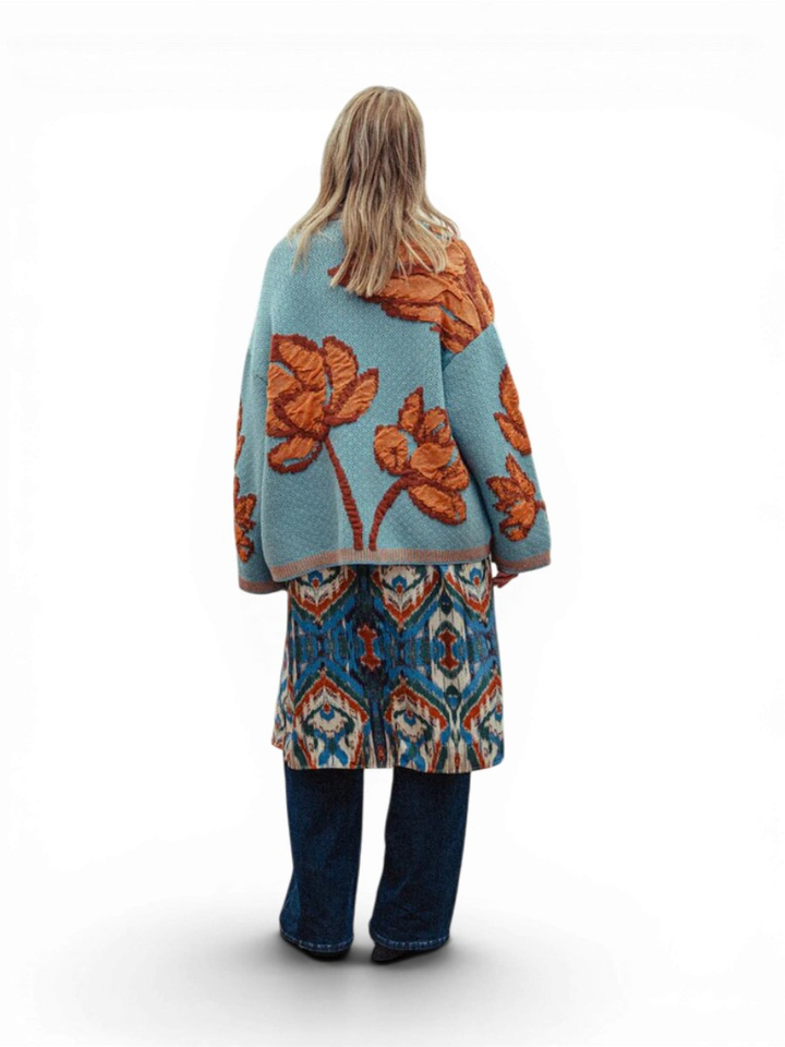 Lichtblauwe gebreide cardigan met oranje print Odussea K&J