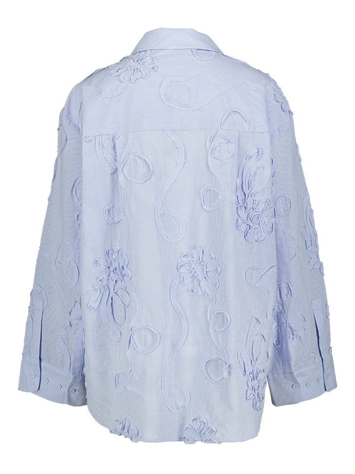 Blauwe gestreepte bloes met bloem detail  Xavier Co'Couture