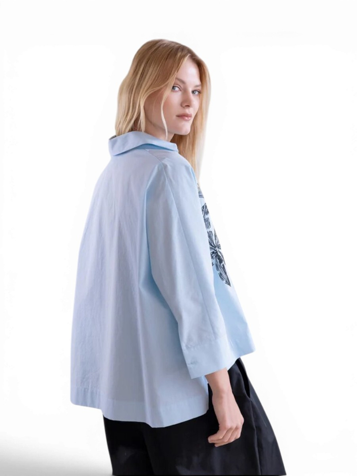 Blauwe blouse met print Psophia