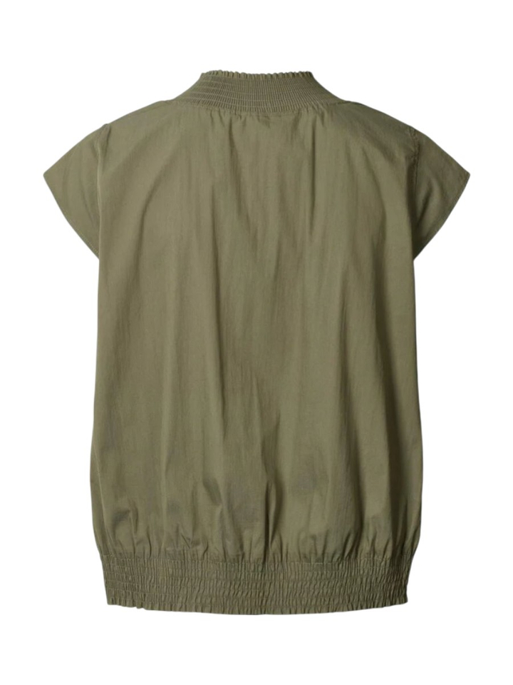 Groene bloes met smok Dori Rabens Saloner 