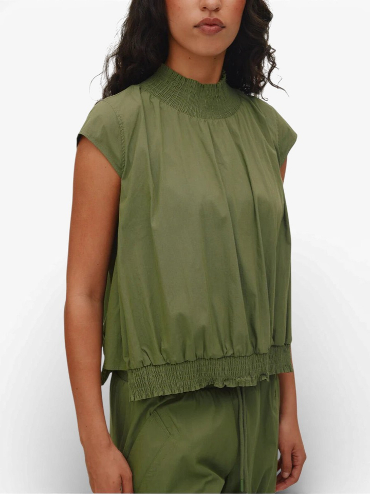 Groene bloes met smok Dori Rabens Saloner 