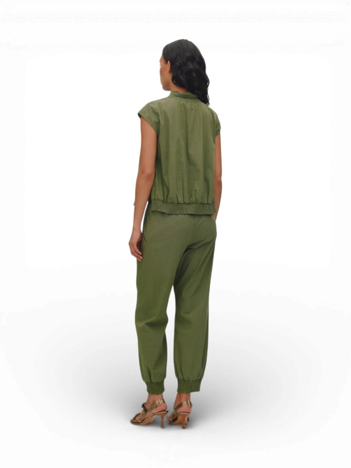 Groene bloes met smok Dori Rabens Saloner 
