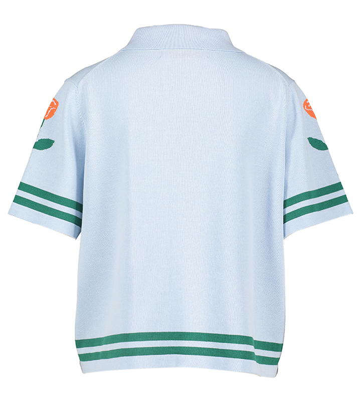 Blauwe polo met bloemen detail The Tiny Big Sister