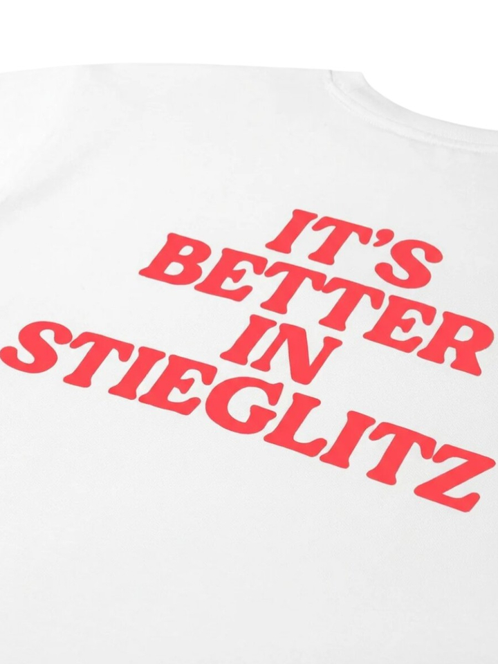 Witte oversized T-shirt met fluo tekst Branca Stieglitz