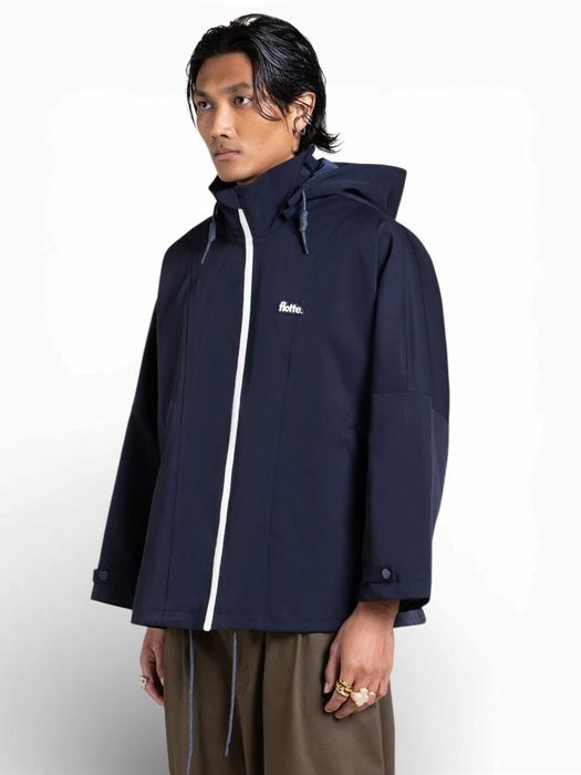 Donkerblauwe oversized regenjas Lourmel Flotte