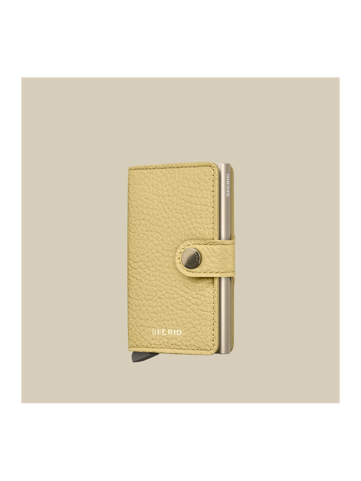 Butter yellow mini pebble Secrid 