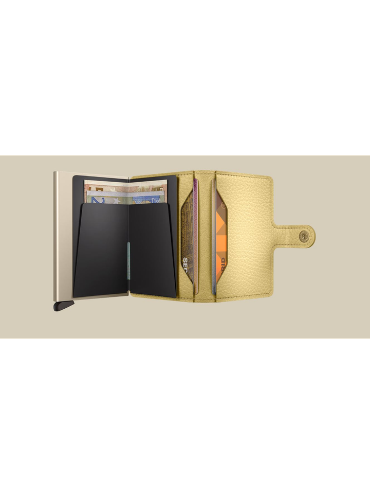 Butter yellow mini pebble Secrid 