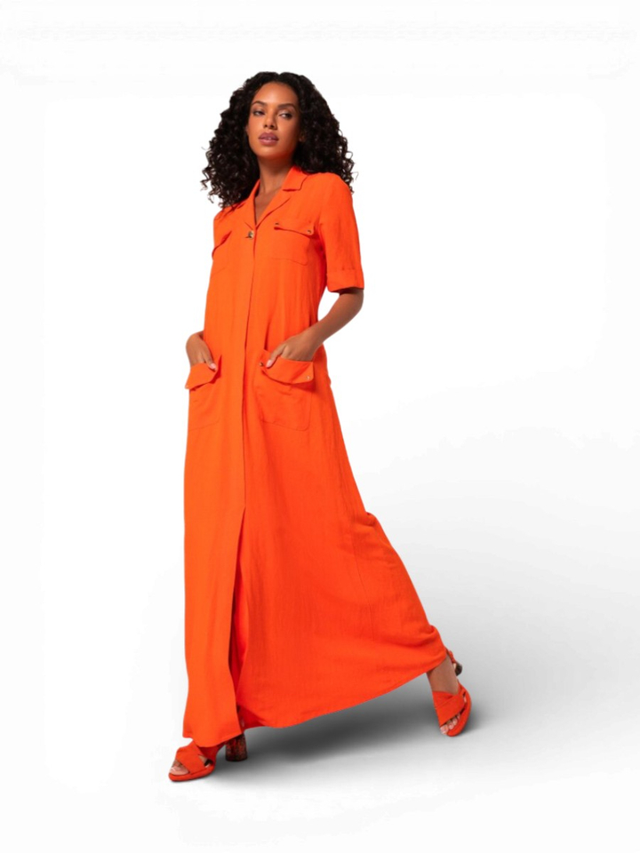Oranje maxi-jurk met pocketdetail Caroline Biss
