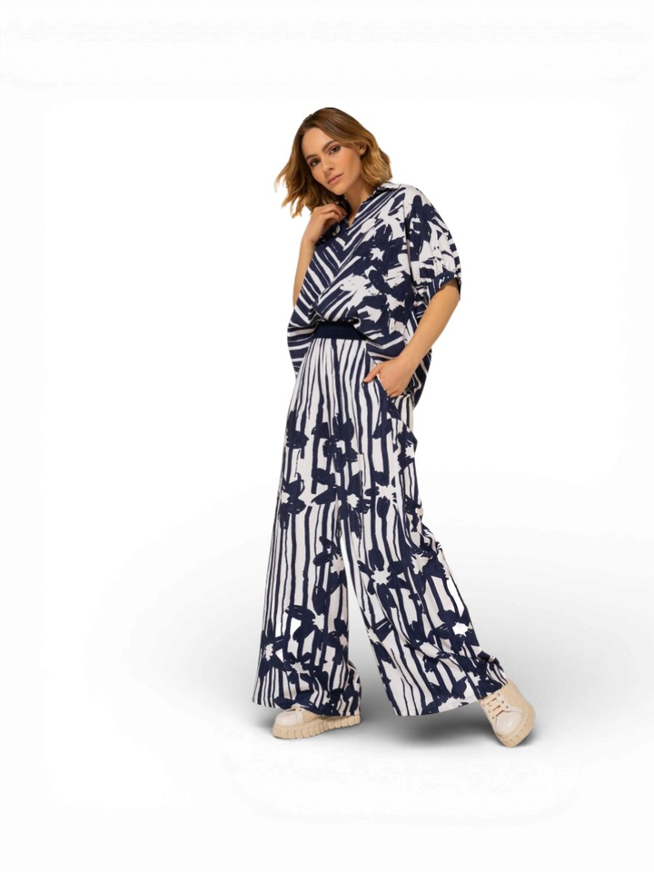 Blauwe gestreepte broek met bloemenprint Caroline Biss 