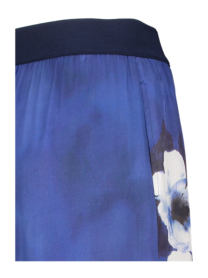 Blauwe losvallende broek in bloemenprint Caroline Biss