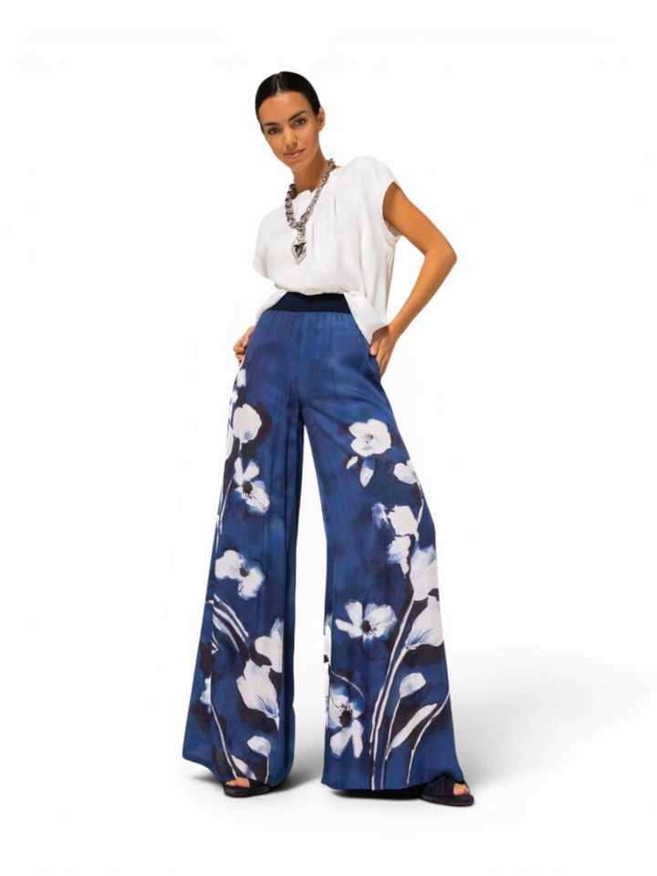 Blauwe losvallende broek in bloemenprint Caroline Biss