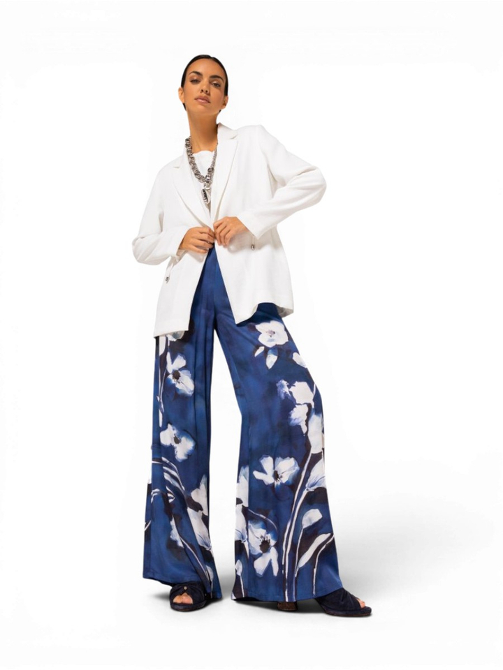 Blauwe losvallende broek in bloemenprint Caroline Biss