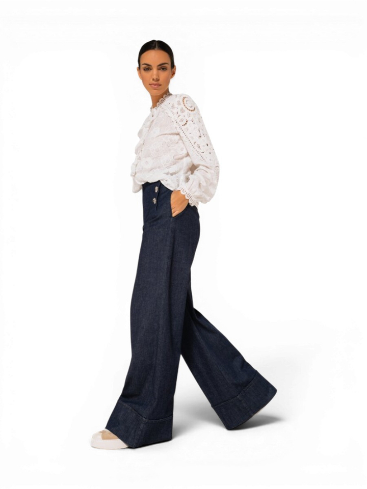 Blauwe loose fit jeans met boord en sierlijke knopen Caroline Biss 