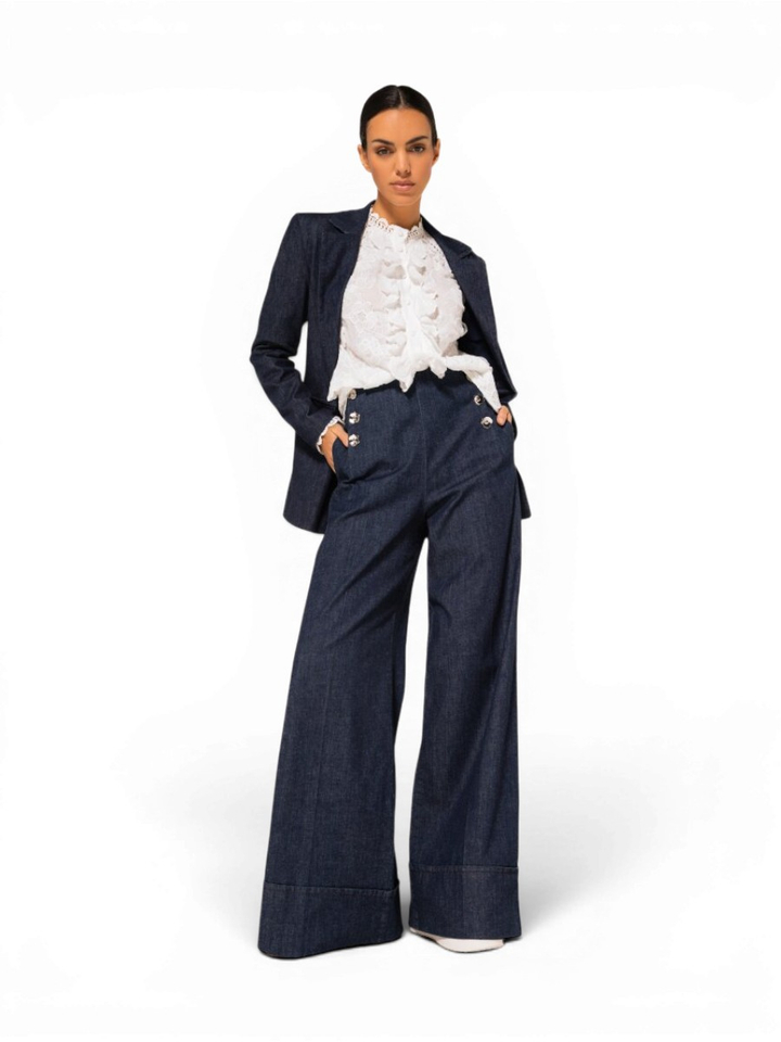 Blauwe loose fit jeans met boord en sierlijke knopen Caroline Biss 