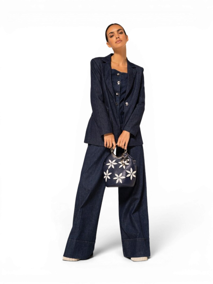 Blauwe loose fit jeans met boord en sierlijke knopen Caroline Biss 