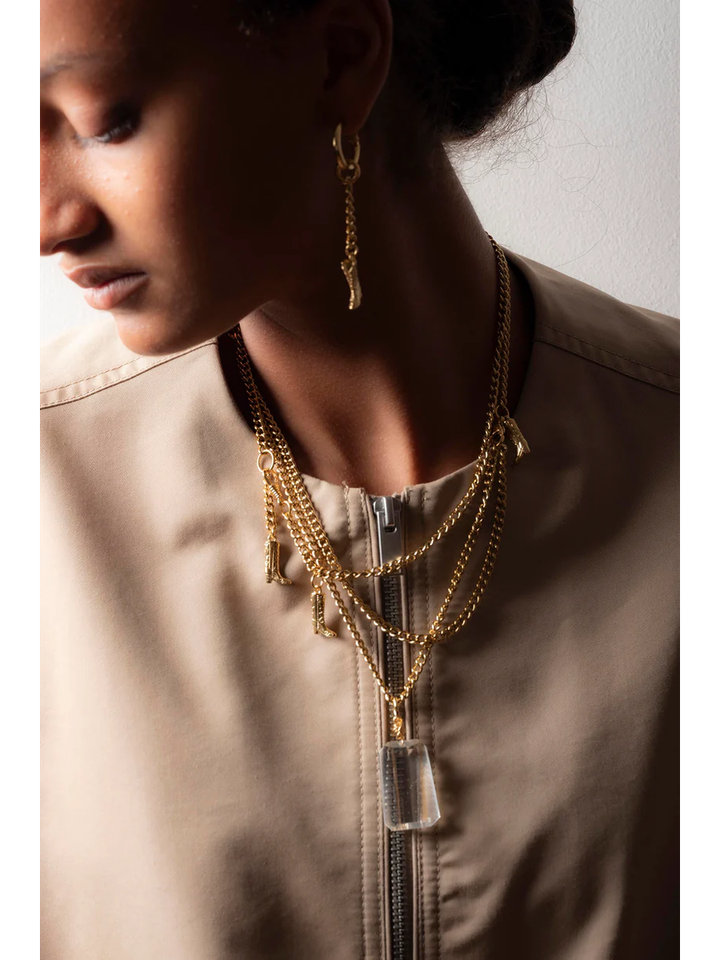 Goud asymmetrische cowboy- en curb chain TEXAS Murielle Perrotti