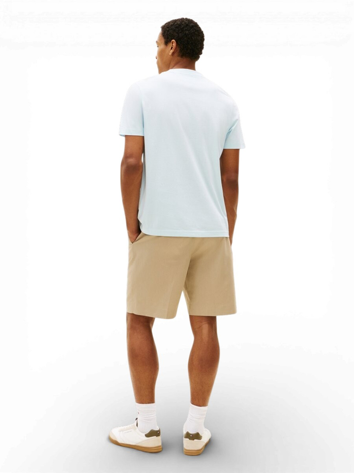 Lichtblauwe t-shirt met oranje logo Tommy Hilfiger 