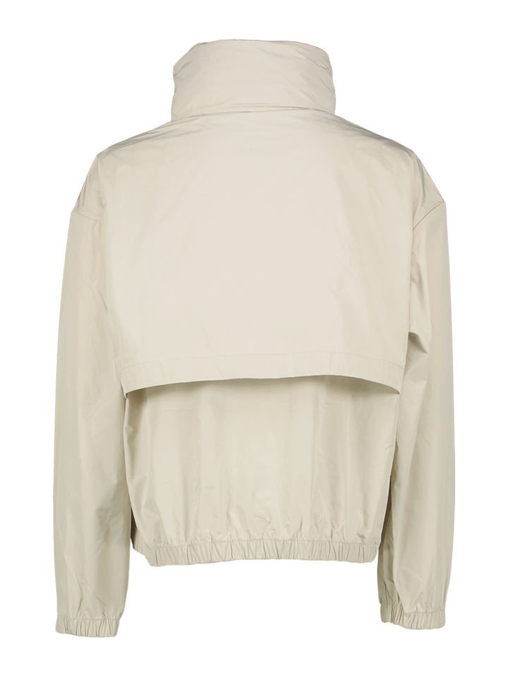 Beige regenjas K-Way