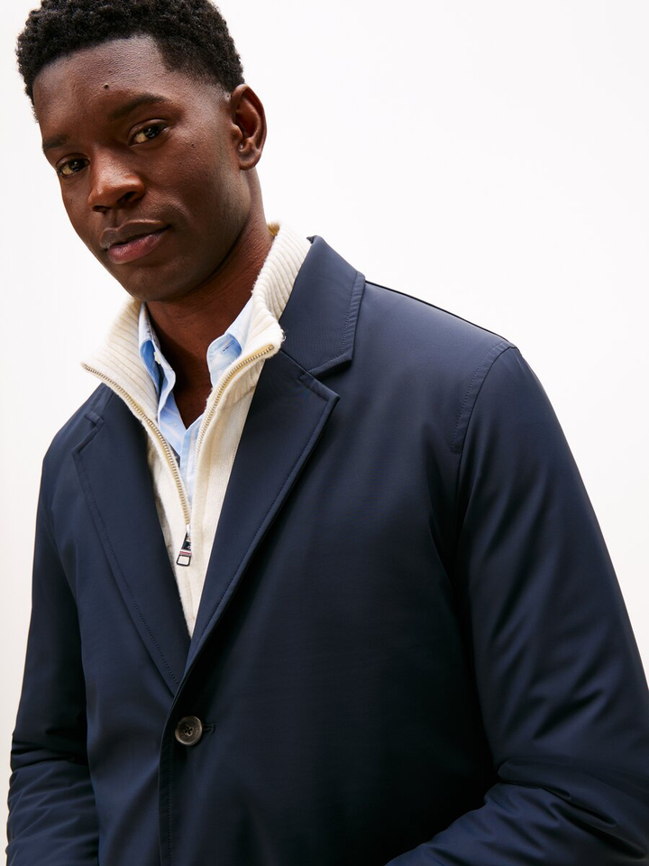 Donkerblauwe lange jas met knopen en rits Tommy Hilfiger