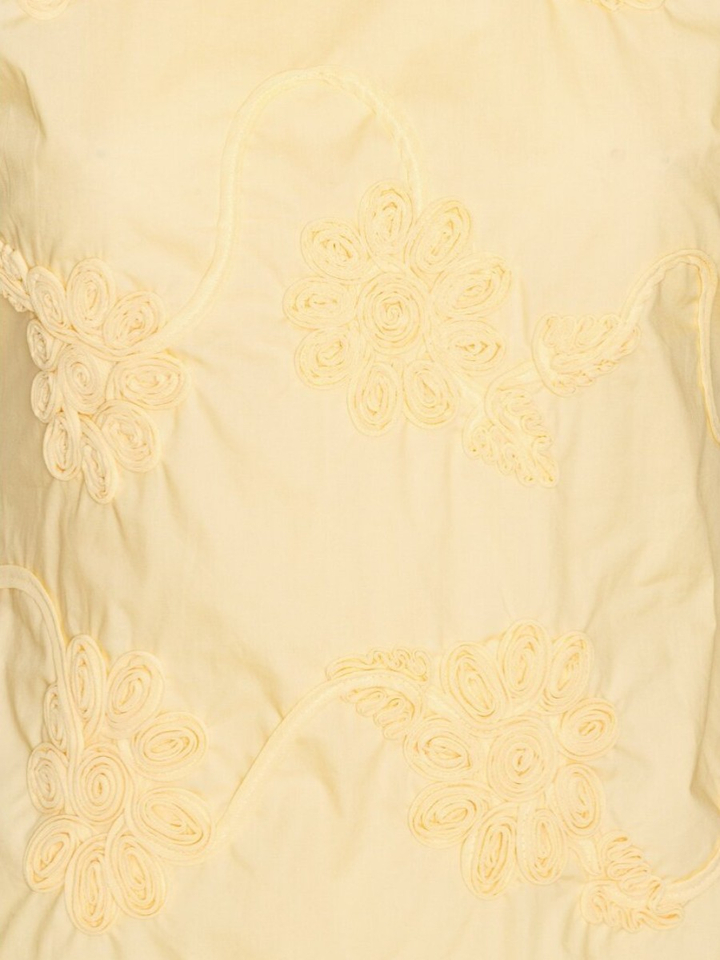 Gele top met geborduurde bloemen Rotate