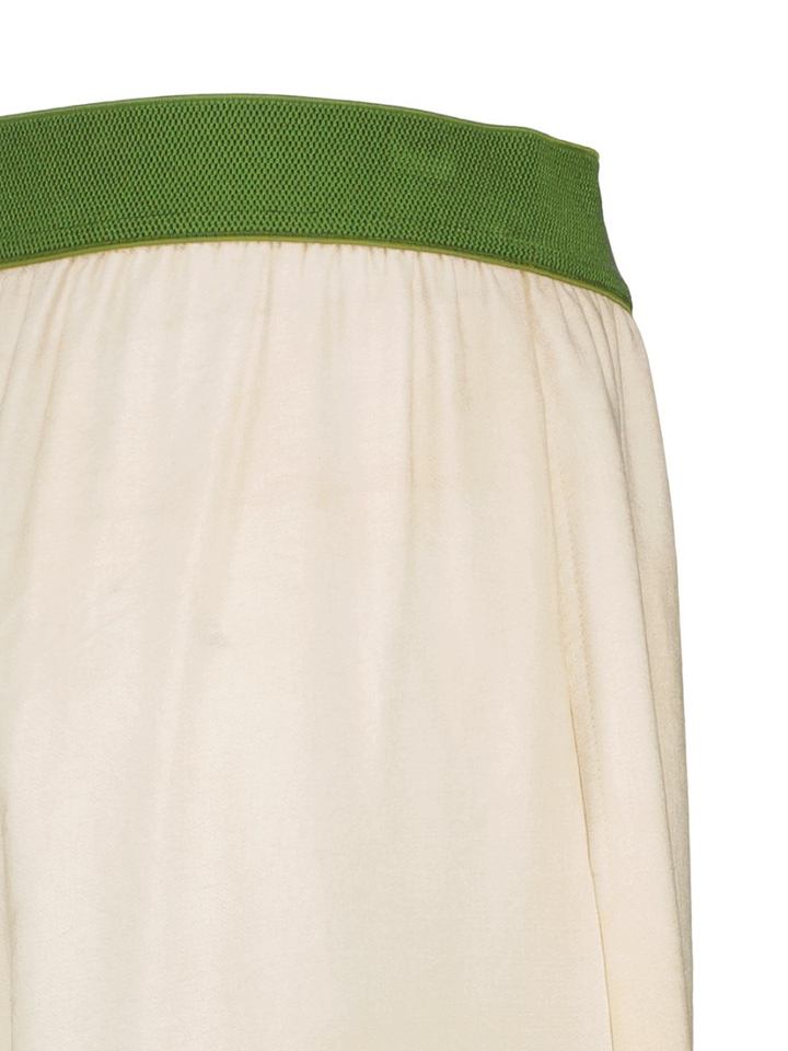 Beige wijde broek met groene bloemenprint Caroline Biss