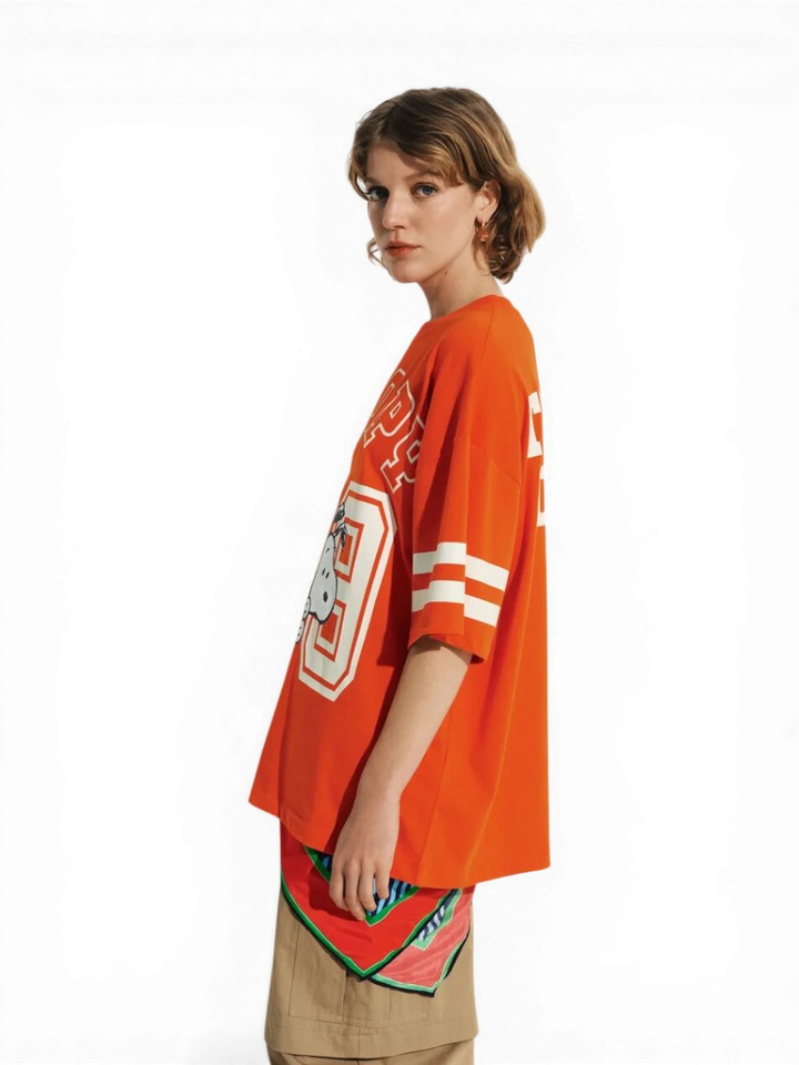 Oranje oversized T-shirt met Snoopy en witte tekst Joopio Essentiel 