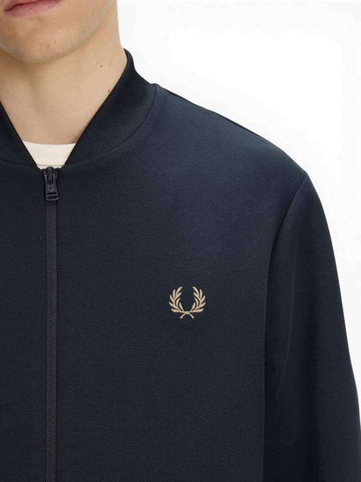 Donkerblauwe cardigan met strepenband Fred Perry 