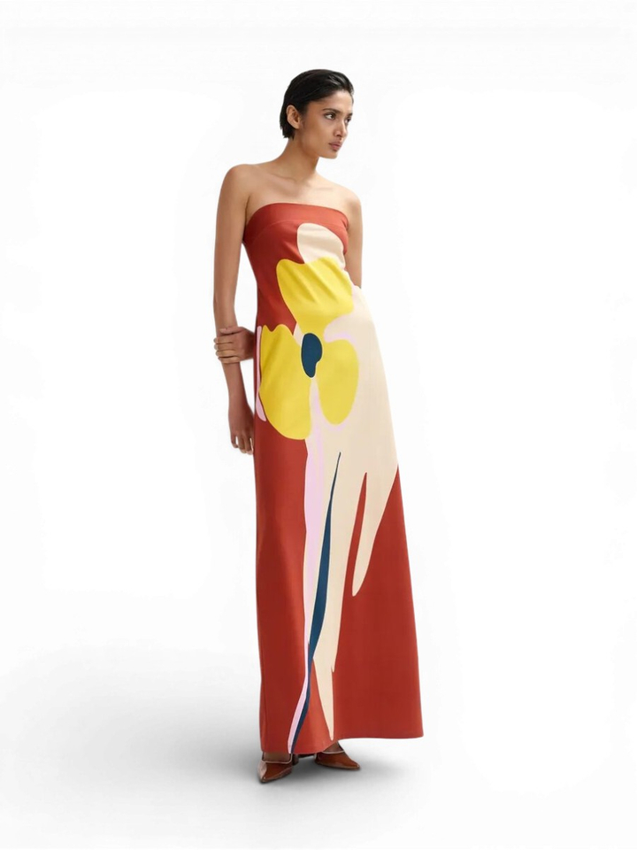 Roestbruine, crème en gele strapless maxi-jurk met oversized bloemenprint Jannick Essentiel 