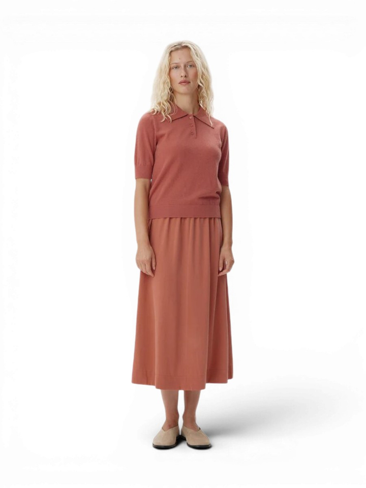 Donkerroze polo in merino wol Ribena Six Ames