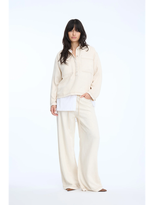 Beige soepelvallende jeans bloes Tuxa Munthe