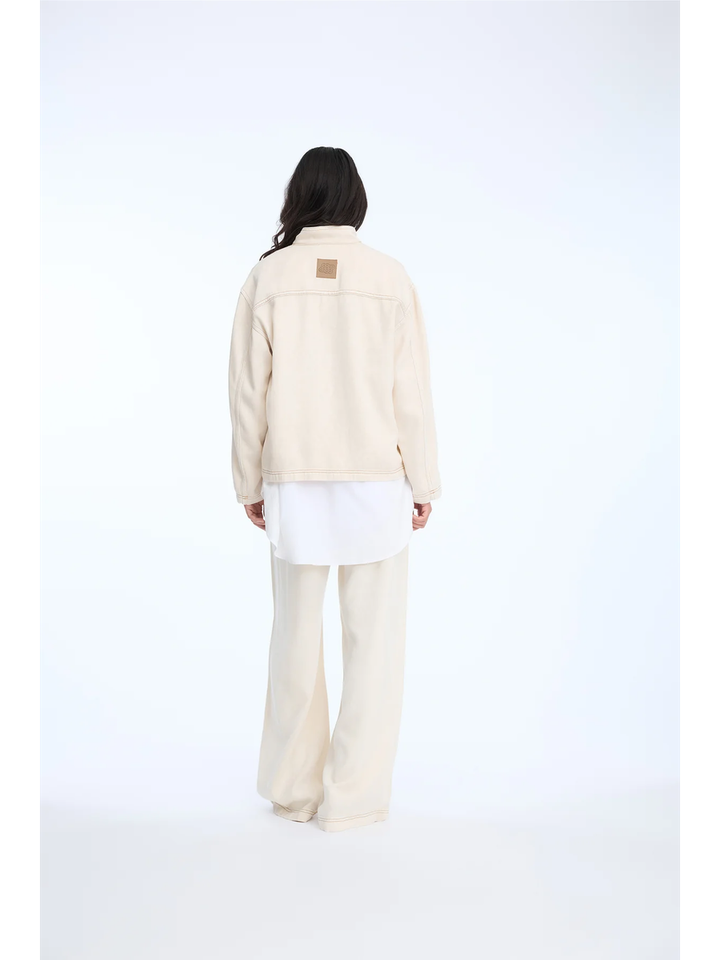 Beige soepelvallende jeans bloes Tuxa Munthe