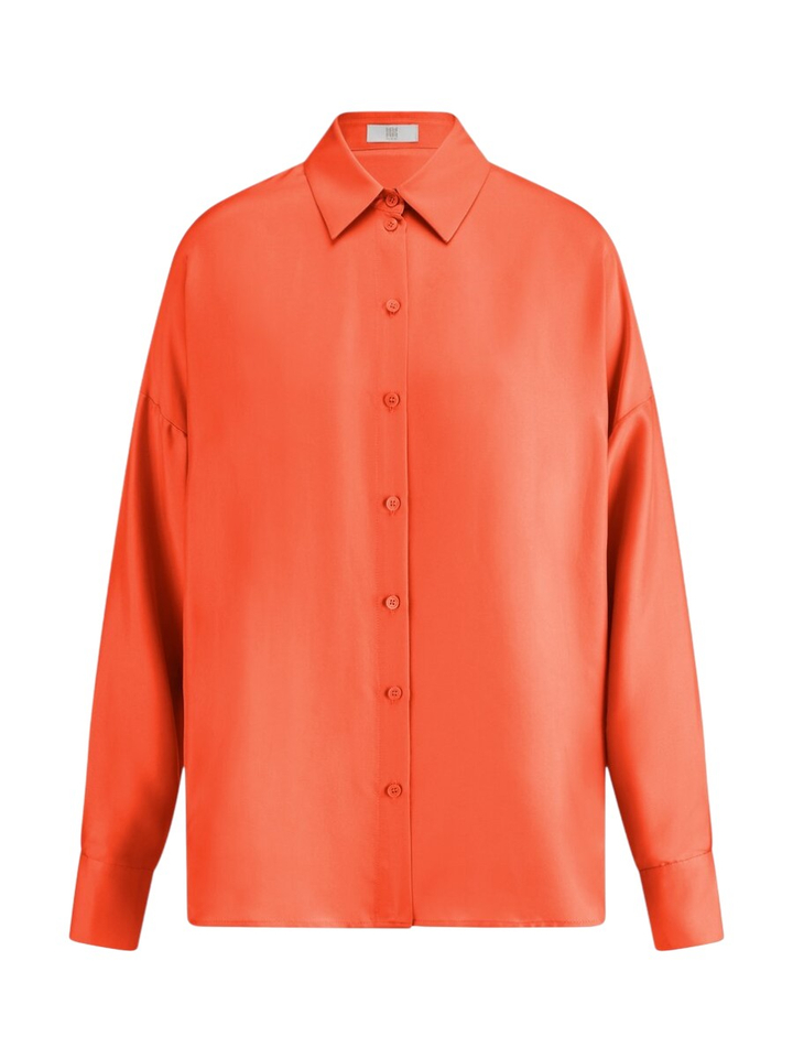 Oranje bloes in zijde Riani 