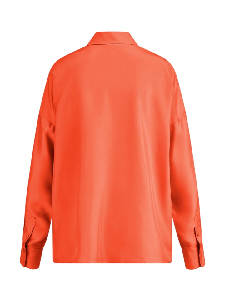 Oranje bloes in zijde Riani 