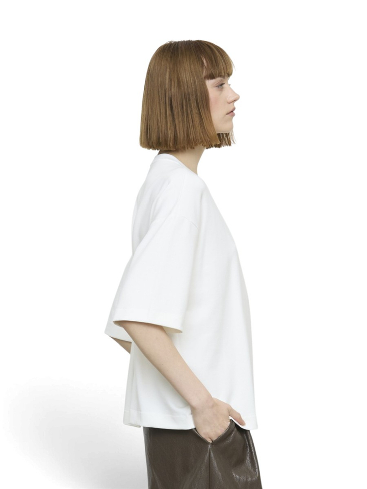 Witte t-shirt met knoopdetail Eleh