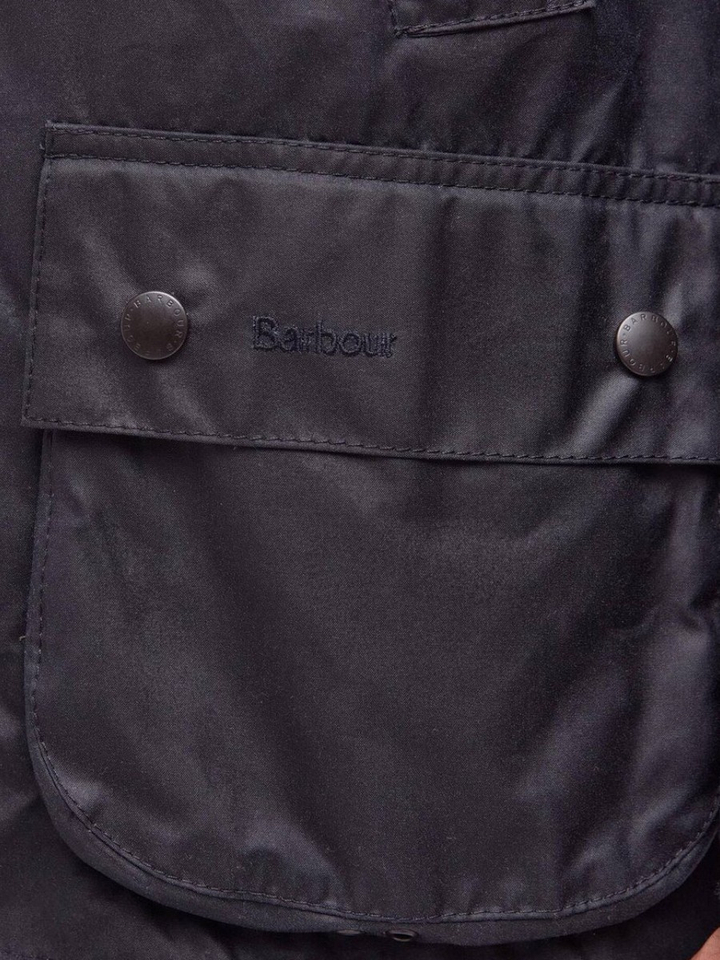 Blauwe waxedd jas met ribfluwelen kraag Barbour 