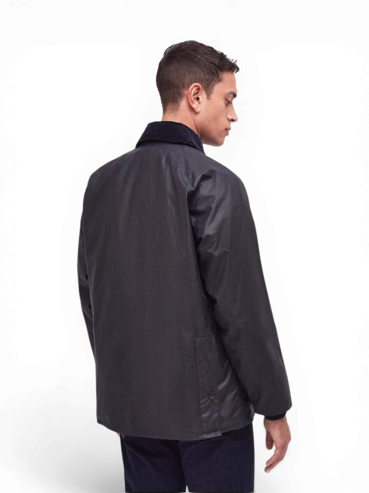 Blauwe waxedd jas met ribfluwelen kraag Barbour 