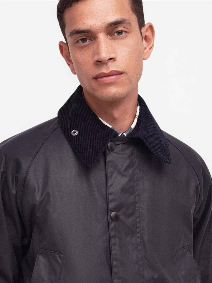 Blauwe waxedd jas met ribfluwelen kraag Barbour 