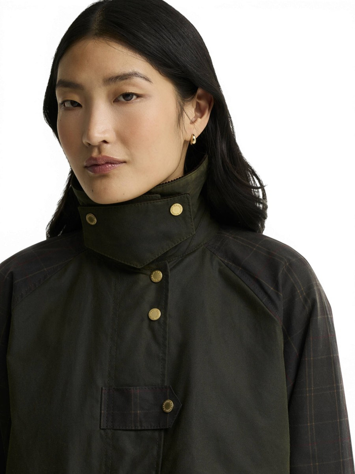 Kaki jas met geruite mouwen en ribfluwelen details Barbour 